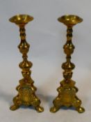 A pair of brass church pricket candlesticks. H.41cm