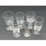 A collection of six 19th and 18th century glasses. Including two 19th century absinthe glasses, a