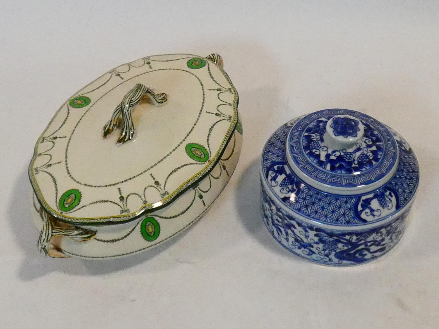 A Royal Doulton lidded tureen and a Chinese blue and white lidded spice pot. H.14 W.31 D.18cm (