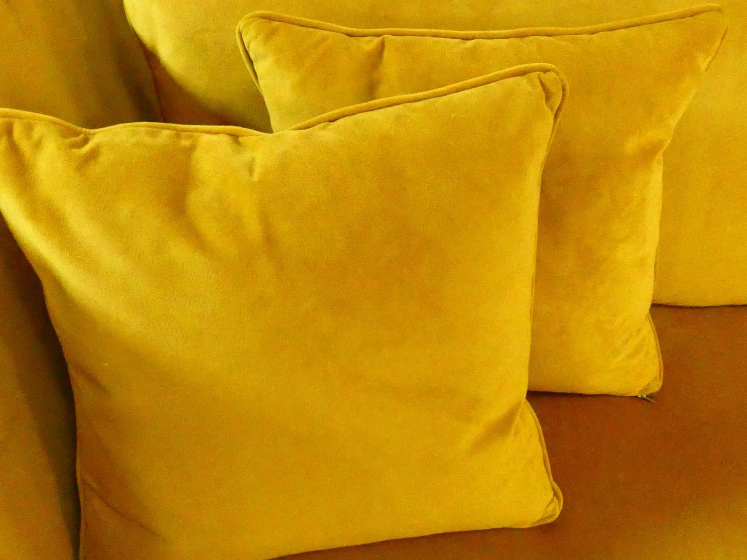 A contemporary Knole sofa in gold upholstery raised on squat square tapering supports on brass cup - Image 4 of 11