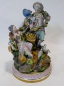 A Meissen hand painted porcelain figure group, 19th century, two lovers, doves and a girl playing