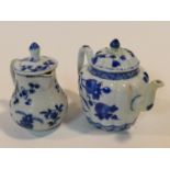 Two 18th century blue and white Chinese porcelain export ware pieces. A floral design teapot with