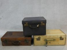 A vintage crocodile skin suitcase, a leather hat case and a vintage case with lift out tray. H.23