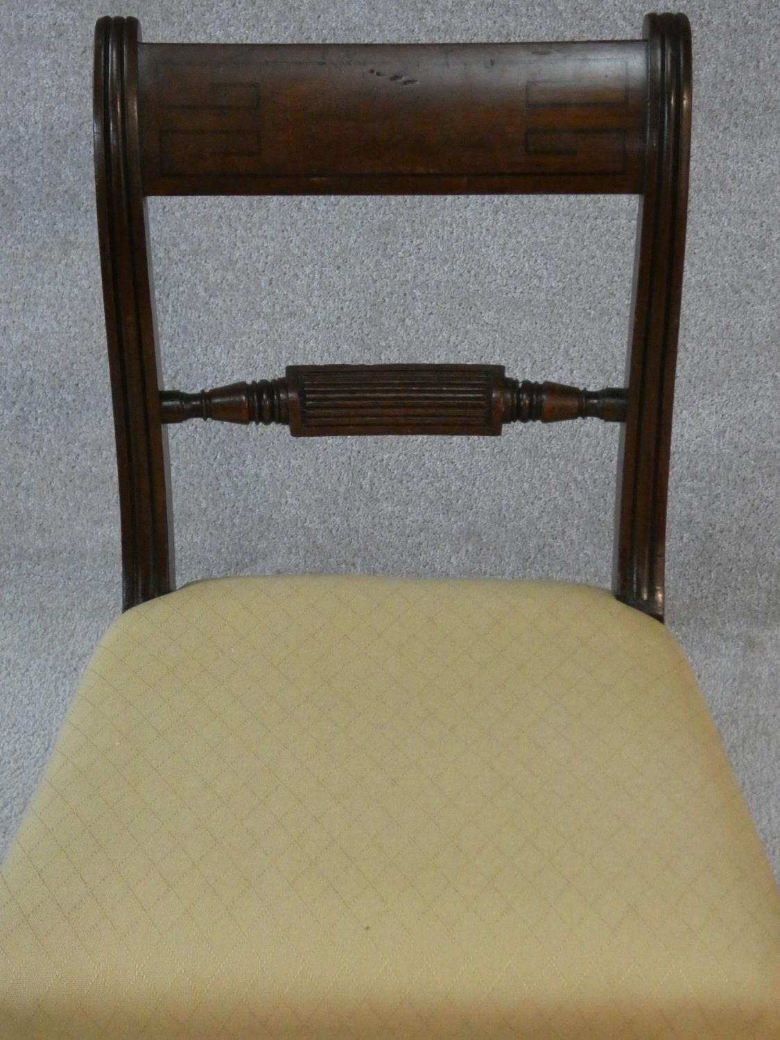 A set of four late Georgian mahogany bar back dining chairs with ebony Greek key pattern inlay above - Image 5 of 7
