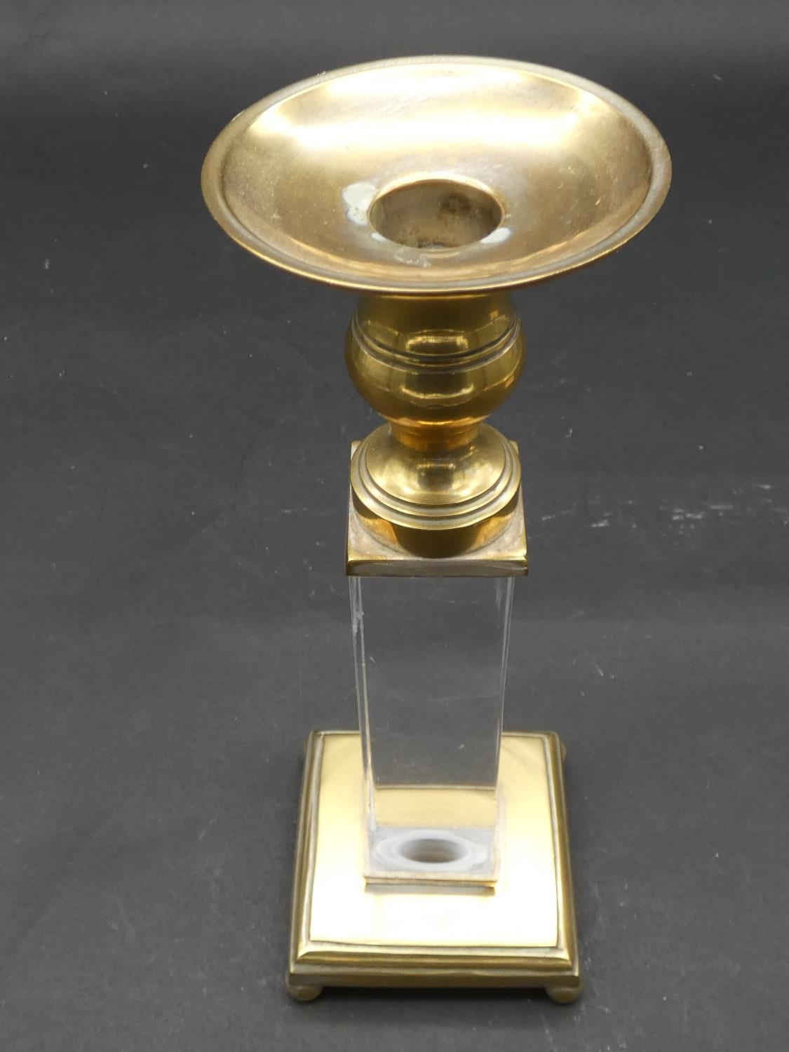 A pair of brass and perspex Empire style candlesticks on platform bases resting on ball feet. H.25cm - Image 3 of 6