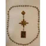 A ceramic glazed and gilded large rosary, with chain link necklace with cube shaped beads. H.39cm