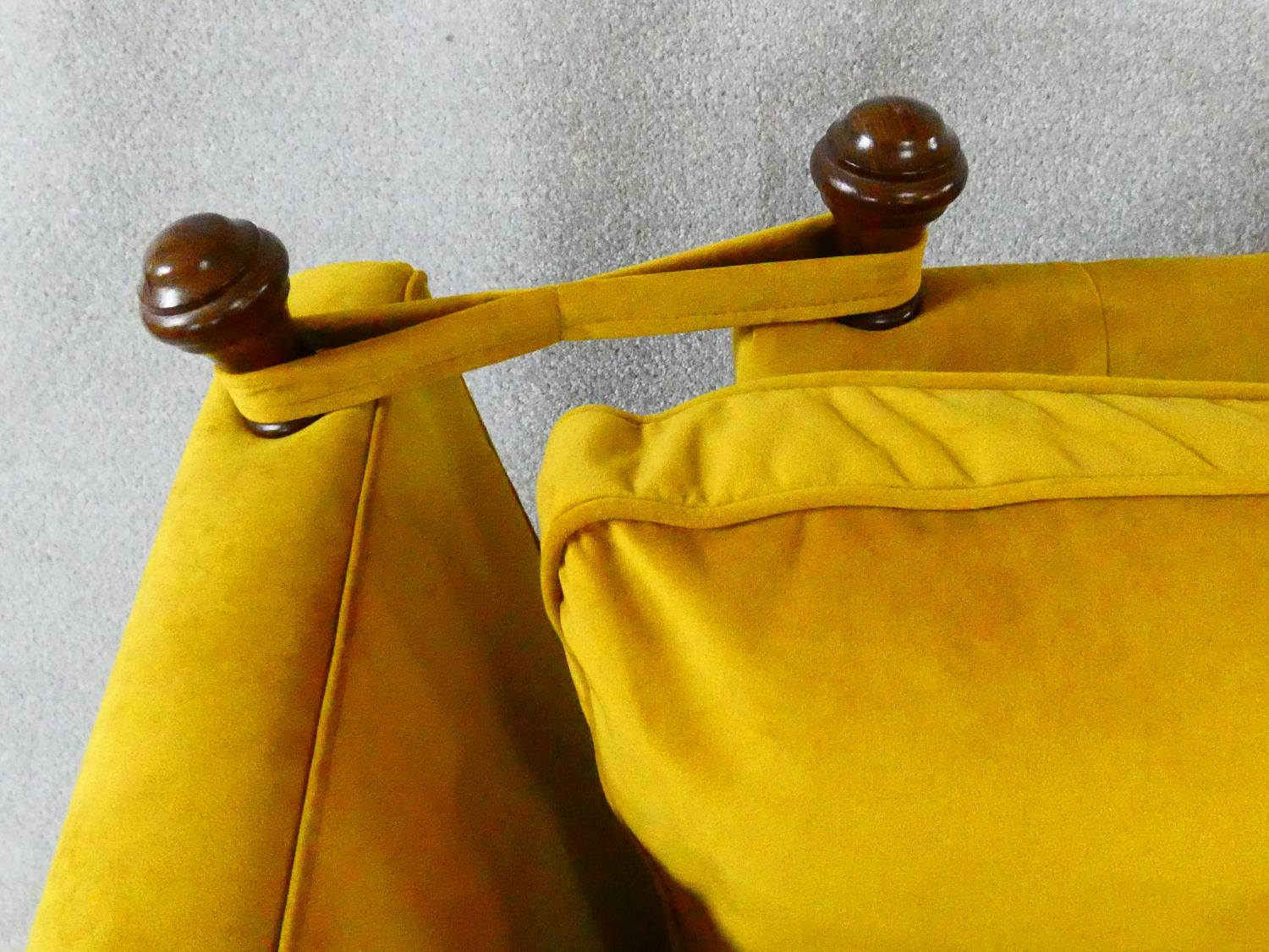 A contemporary Knole sofa in gold upholstery raised on squat square tapering supports on brass cup - Image 5 of 11