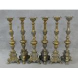 A set of six ecclesiastic style brass pricket candleticks. H.60cm