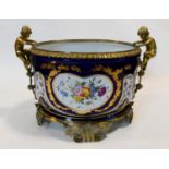 A Russian Gardner porcelain table centrepiece planter in deep blue glaze with gilded handpainted