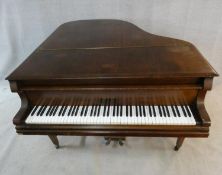 A 'Lestel' of London mahogany cased boudoir baby grand piano, metal framed, raised on square