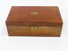 A 19th century mahogany writing slope with tooled leather inset writing surface and brass carrying