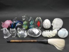 A collection of paperweights and Art Glass, crystal skull, hand painted porcelain egg paperweight