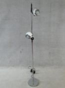 A vintage style chrome standard lamp fitted with two adjustable spotlights. H.147cm