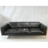 A Robin Day Forum style three seater sofa by Habitat in black leather. H.72 W.206 L.82cm (one