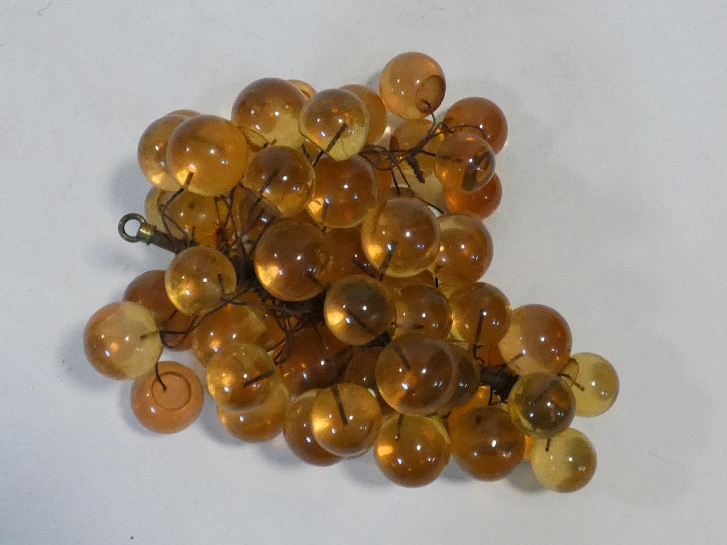 A vintage amber acrylic bunch of grapes mounted on wires. H.19xW.34xL.28cm - Image 3 of 4