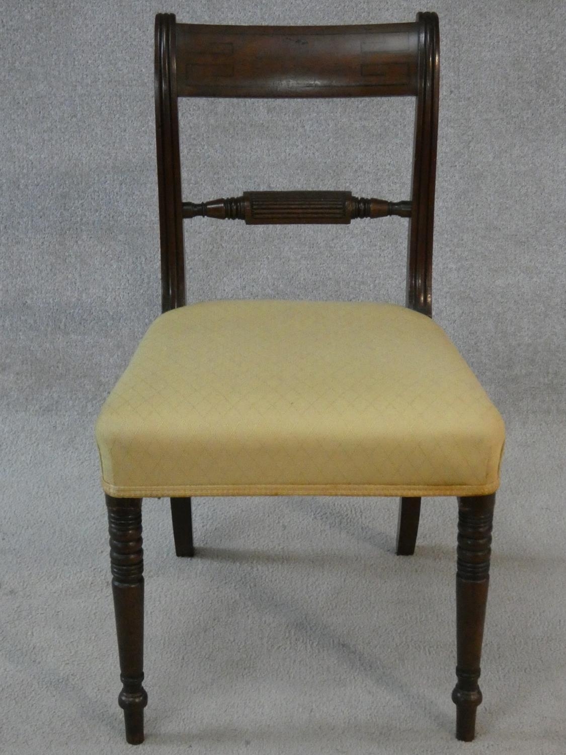 A set of four late Georgian mahogany bar back dining chairs with ebony Greek key pattern inlay above - Image 3 of 7
