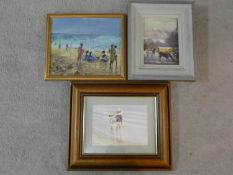 A framed and glazed watercolour, children on a beach, signed and two framed oils on canvas, a