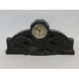 A German Art Deco spelter mantel clock, the central face flanked by crouching panthers on stepped