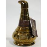 A rare Wade, discontinued pot still shaped decanter from Whyte & Mackay. Aged 12 years old, it is