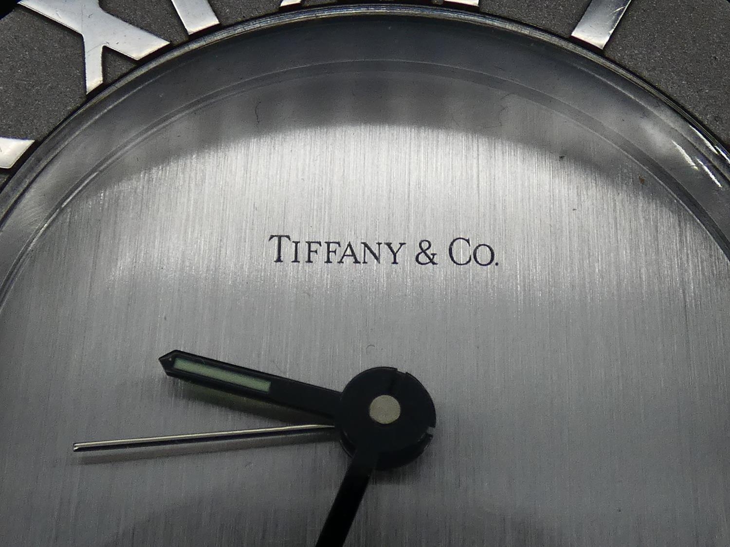 A Tiffany & Co Swiss made stainless steel Roman numeral quartz alarm clock with brushed chrome bezel - Image 2 of 6