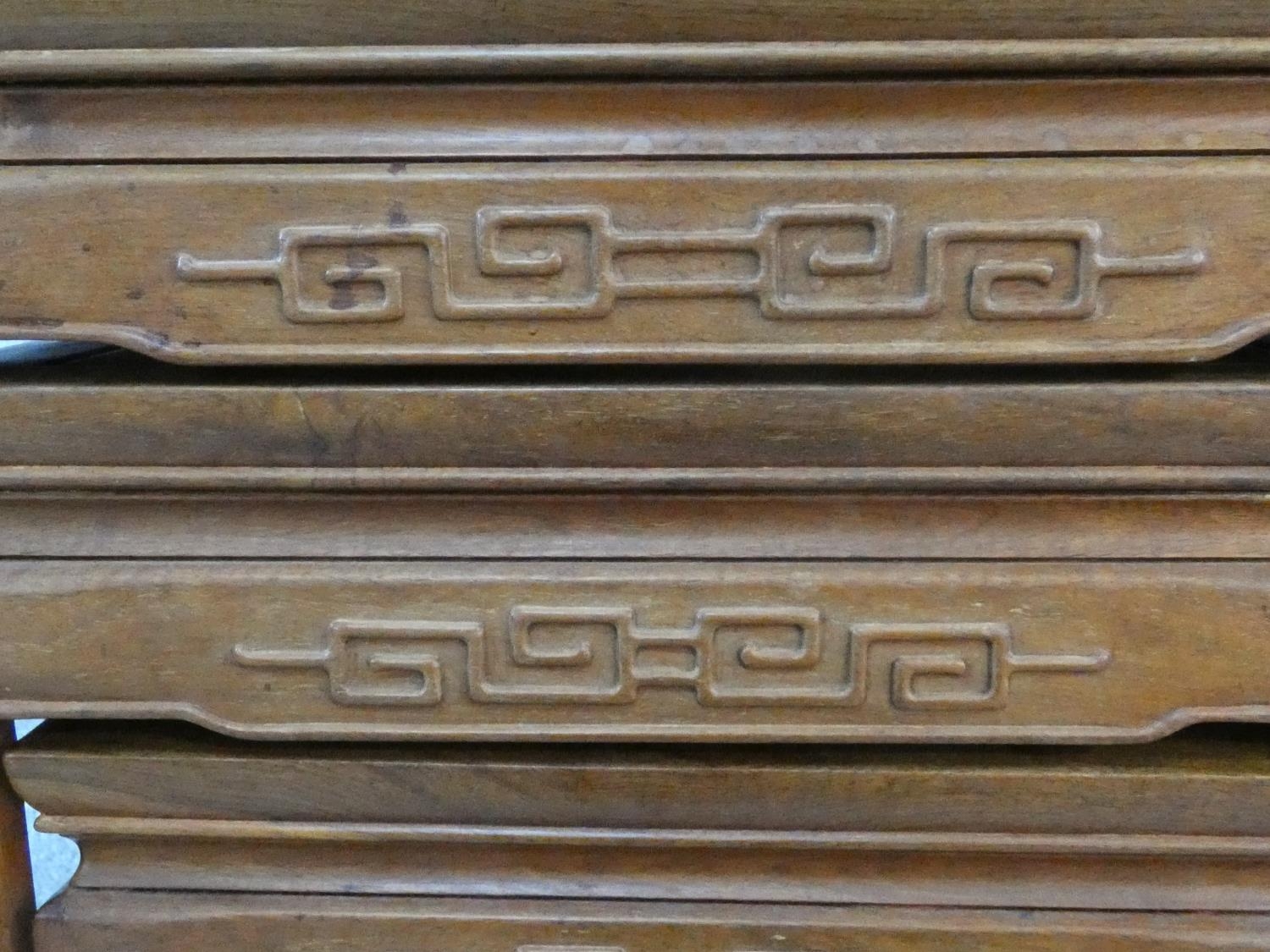 A nest of four Chinese hardwood graduating occasional tables with carved frieze on shaped - Image 15 of 22