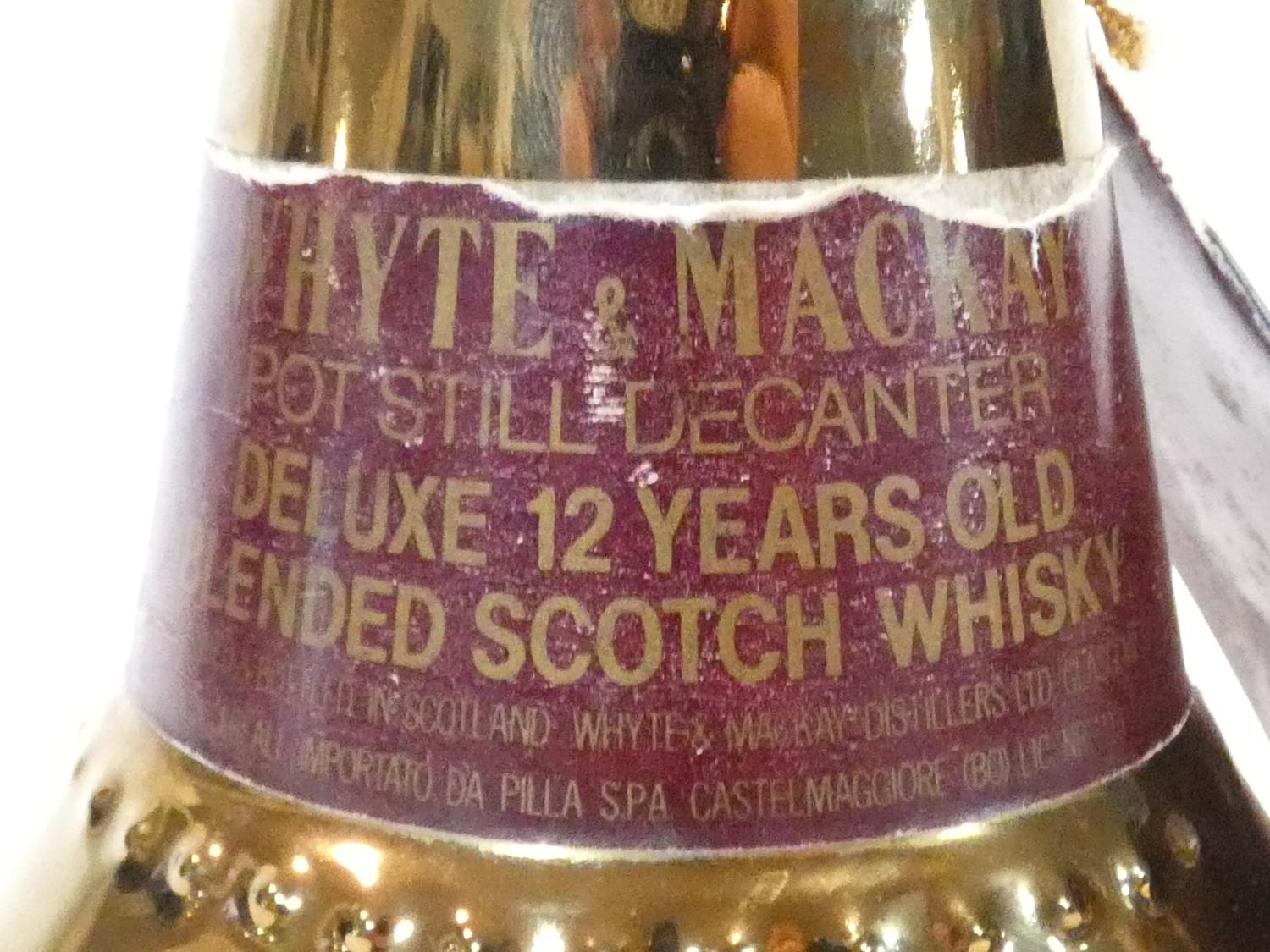 A rare Wade, discontinued pot still shaped decanter from Whyte & Mackay. Aged 12 years old, it is - Image 7 of 18