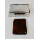 A silver cedar lined cigarette box and faux tortoiseshell cigarette case. H.4xW.13xL.9cm
