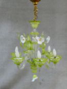 A Venetian glass six branch chandelier with flowerhead and leaf decoration. H.90 D.50cm
