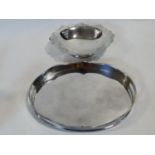 A silver plated twin handled galleried tray along with a silver plated comport with pierced