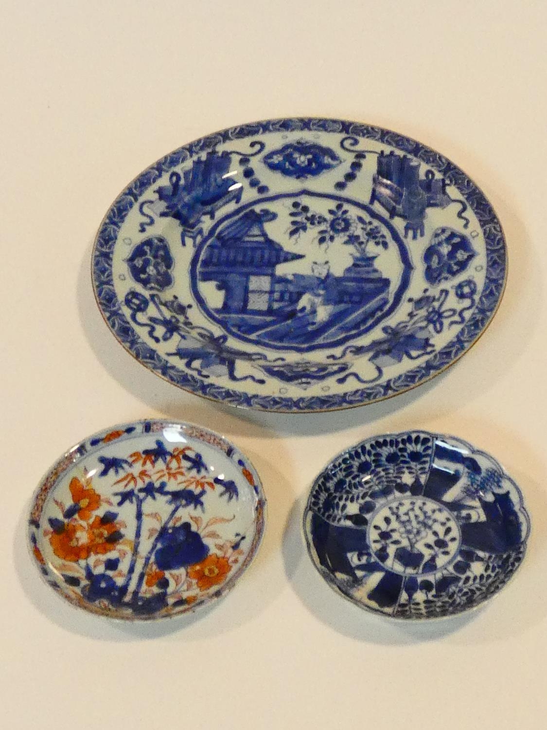 Three 18th century Chinese porcelain hand painted export ware dishes. One Kangxi style plate with