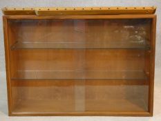 A 1960's vintage teak wall hanging cabinet with fittings. H.56 W.80 D.24cm