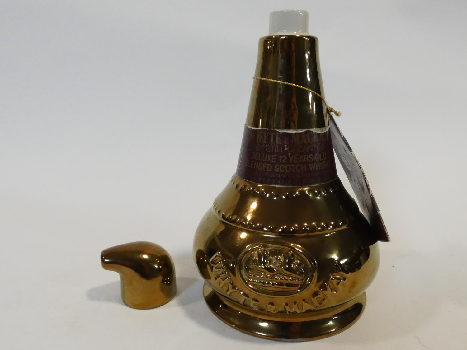 A rare Wade, discontinued pot still shaped decanter from Whyte & Mackay. Aged 12 years old, it is - Image 10 of 18
