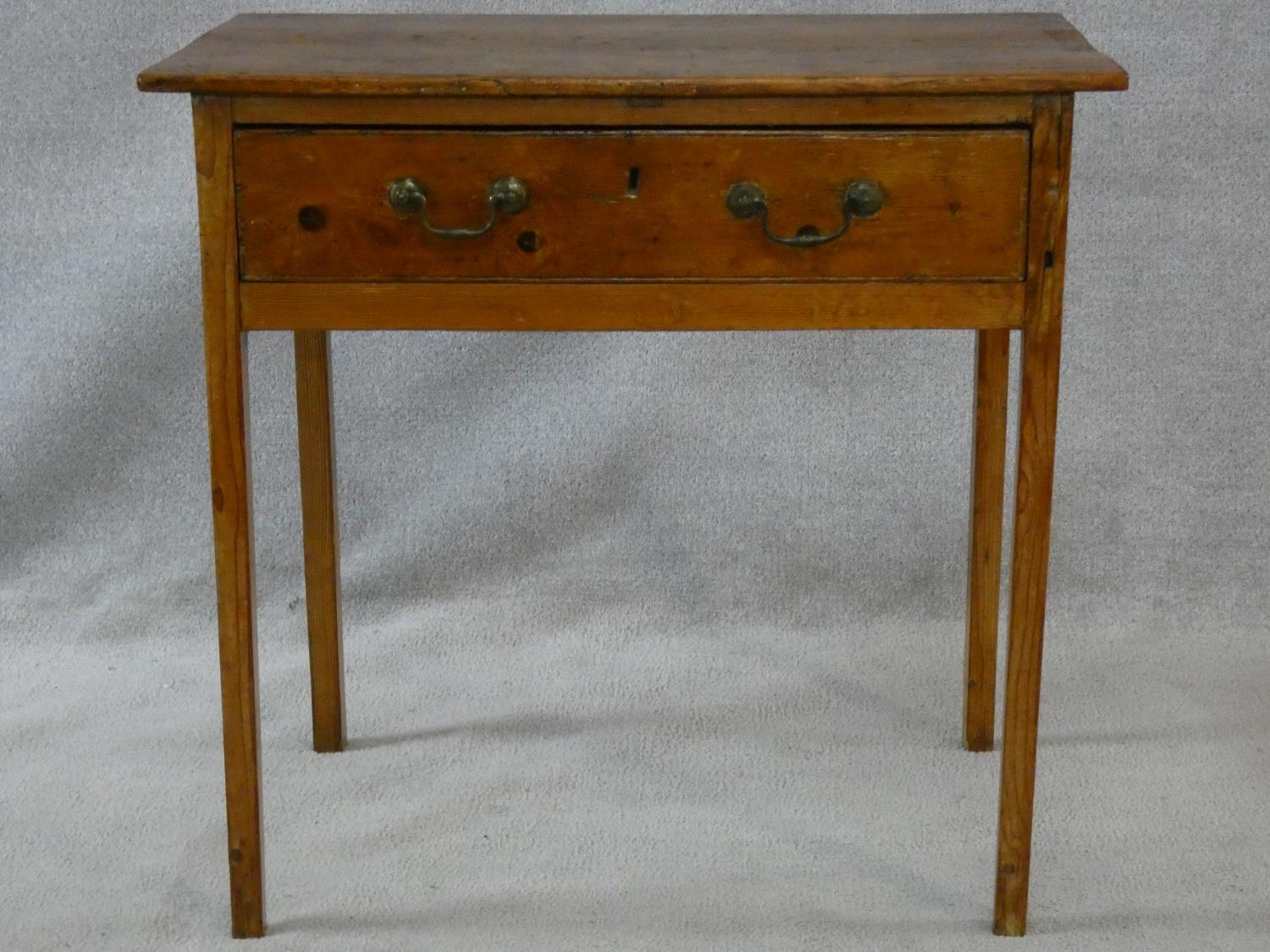 A 19th century pine side table with frieze drawer on square supports. H.73 W.76 D.45cm