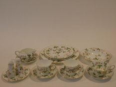 A Wedgwood Wild Strawberry pattern part tea service. Including three cups and saucers, salt and