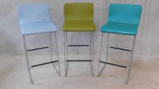 Three Orangebox high stools with upholstered seats on chrome supports. H.100cm