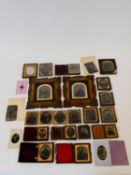 A collection of twenty five 19th century daguerreotypes and ambrotypes. Some with velvet lined