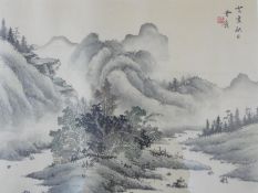 A framed and glazed ink on silk, Japanese mountainscape, stamped. 43x50cm