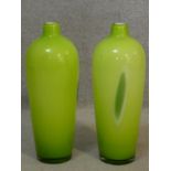 A pair of high shouldered lime green baluster form Art Glass vases H.41cm