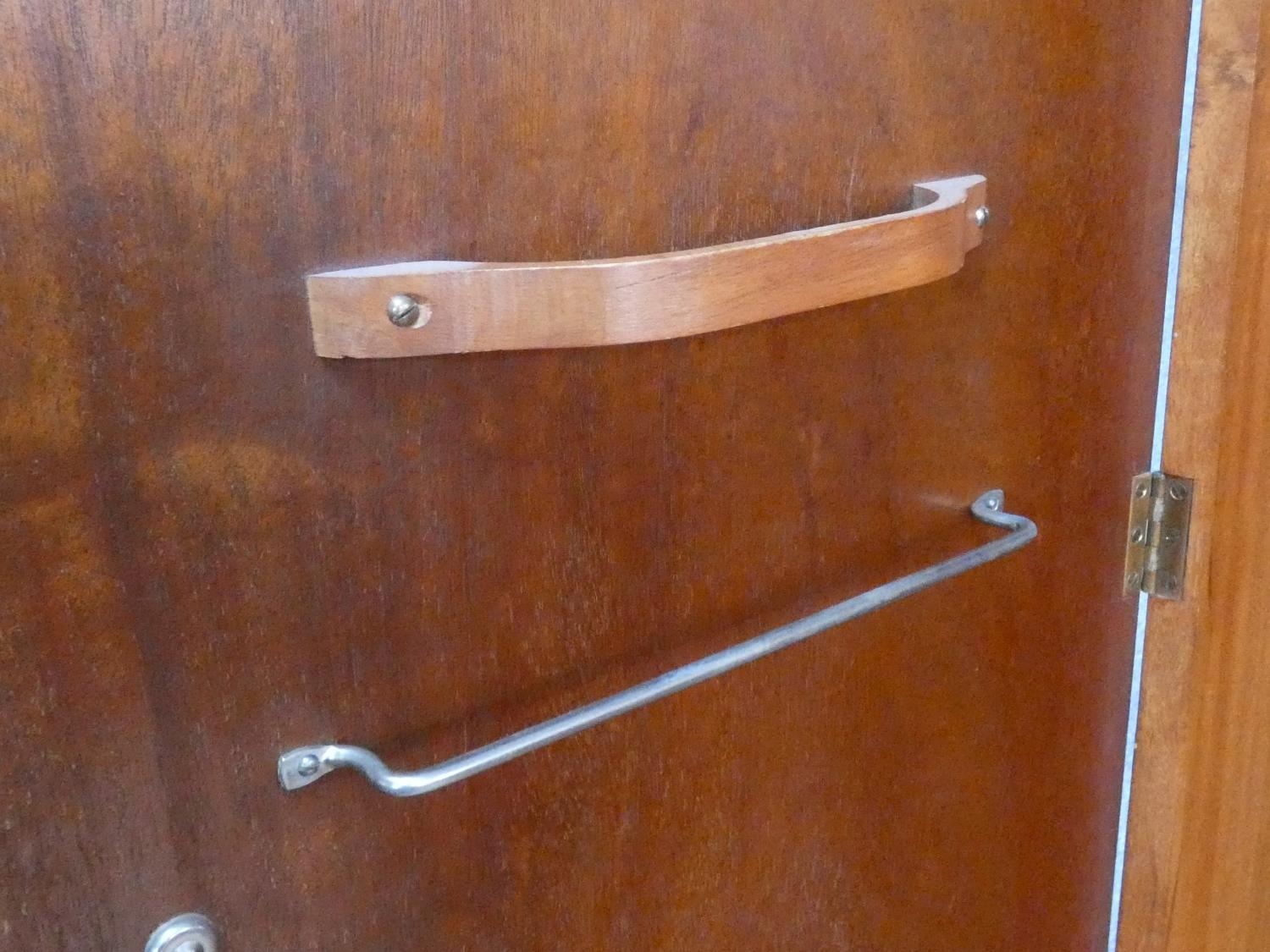 A 1960's fitted teak compactum wardrobe with inset Heal's disc to the inside of door. H.178 W.92 D. - Image 6 of 12