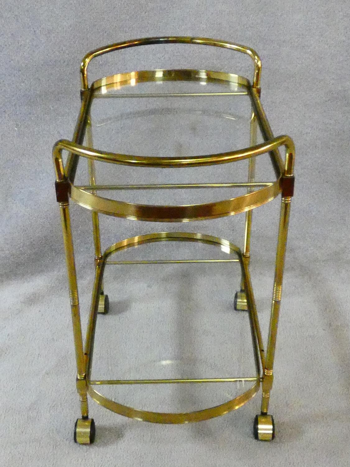 A vintage style brass serving trolley with two inset glass tiers. H.76 L.72 W.43cm - Image 8 of 16