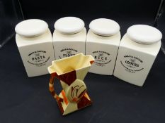 A set of four Swan & Taylor ceramic kitchen storage jars and a hand painted Myott & Son ceramic