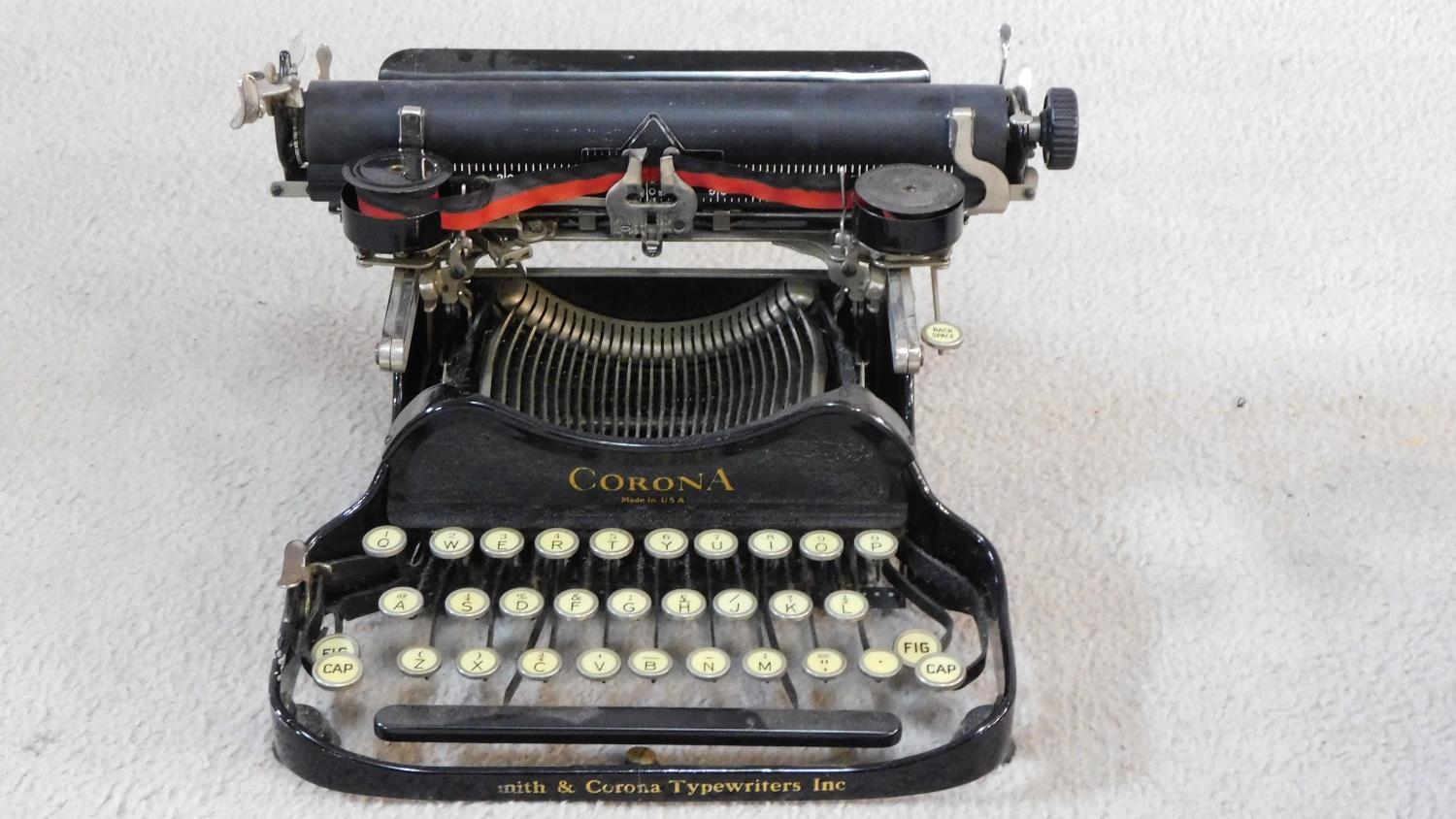 Corona black enamel metal typewriter inscribed L C Smith & Corona Typewriters Inc, in carrying case. - Image 2 of 6