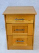 A contemporary oak three drawer cabinet. H.70xW.52xD.49cm