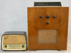 A 1930's walnut cased Murphy 188 floor standing valve radio with concave outline along with a