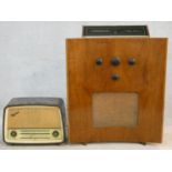 A 1930's walnut cased Murphy 188 floor standing valve radio with concave outline along with a
