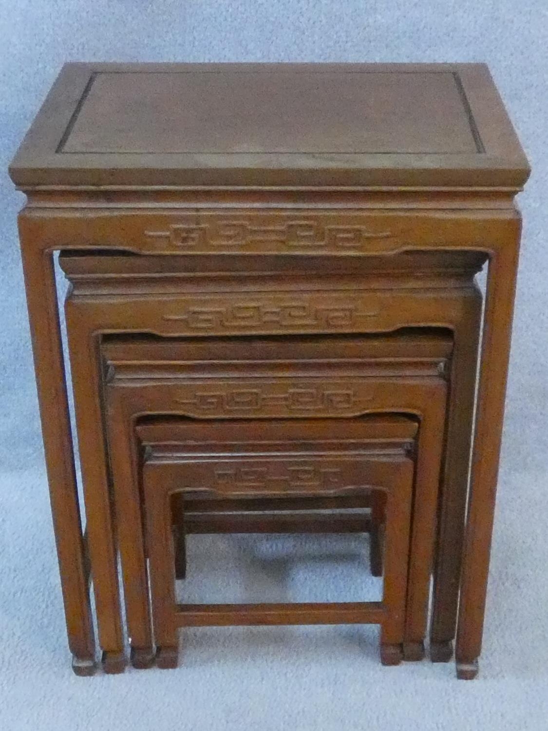 A nest of four Chinese hardwood graduating occasional tables with carved frieze on shaped - Image 2 of 22