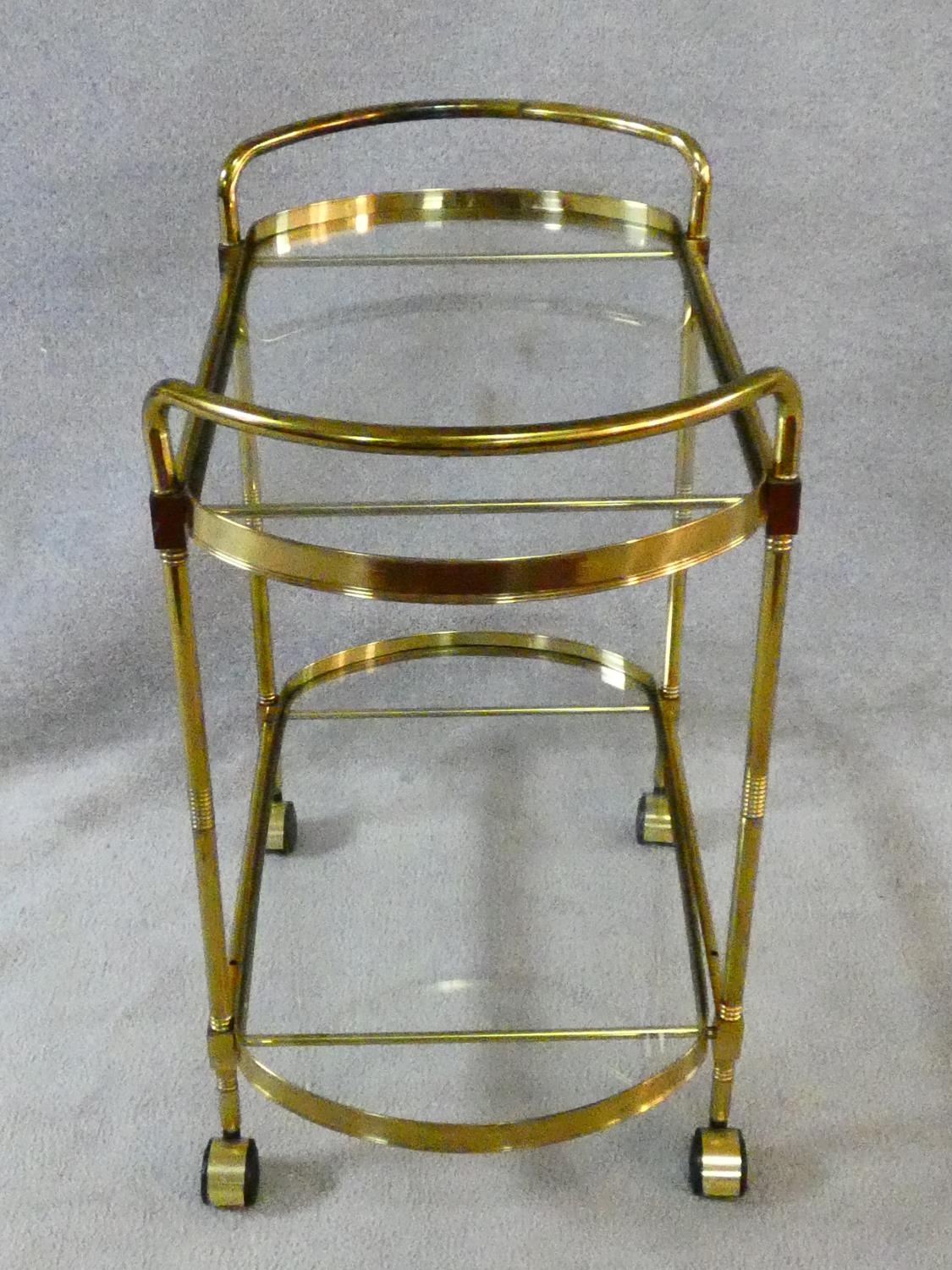 A vintage style brass serving trolley with two inset glass tiers. H.76 L.72 W.43cm - Image 7 of 16