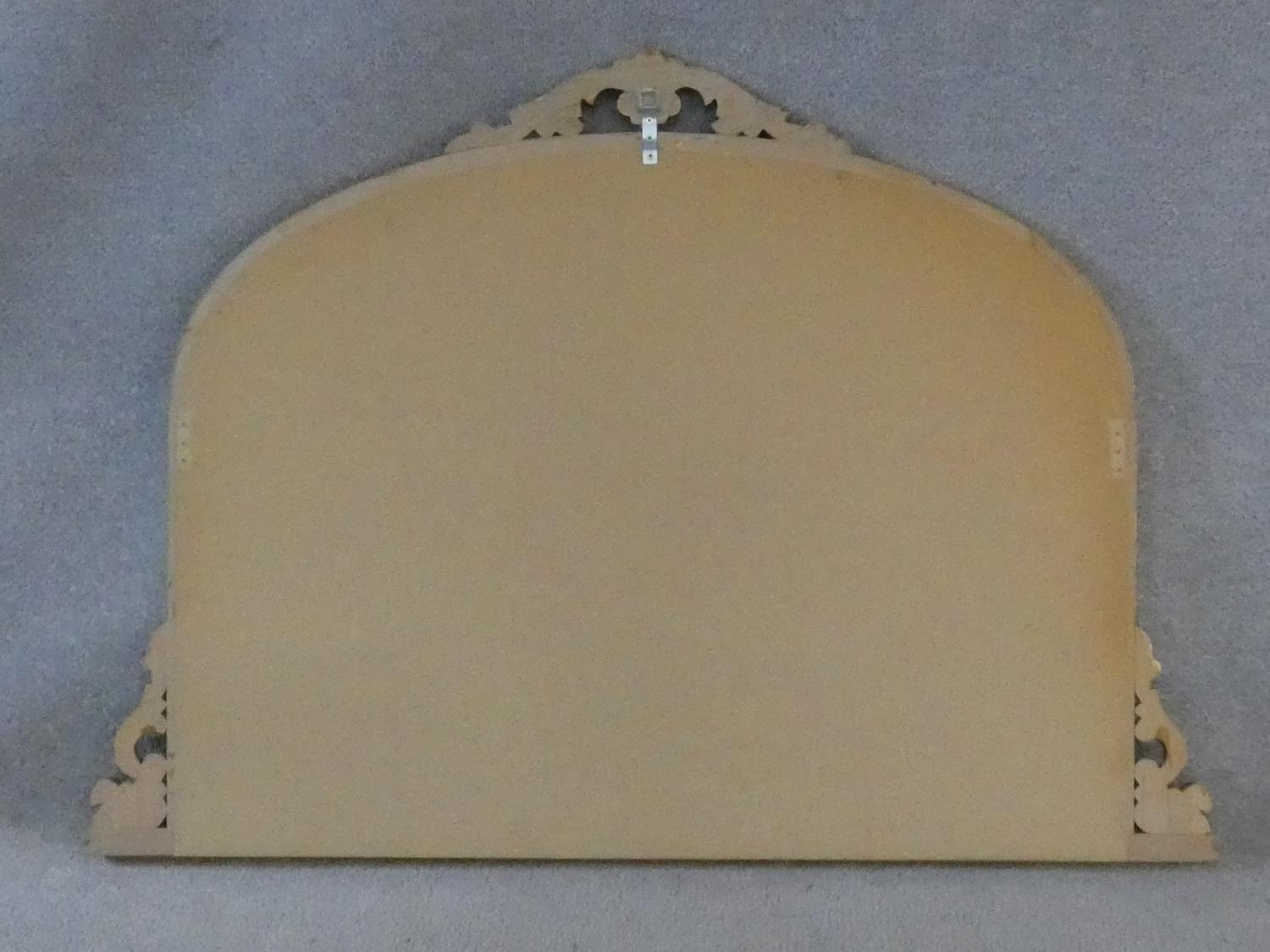 A Victorian style gilt framed overmantel mirror with scrolling foliate cresting. H.91 W.128cm - Image 4 of 4