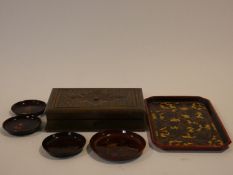 Four Japanese lacquer dishes decorated with flowers and birds, an Indian floral design tray and an