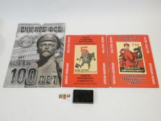 A collection of Russian ephemera. Including a calendar celebrating the 100 year anniversary of the